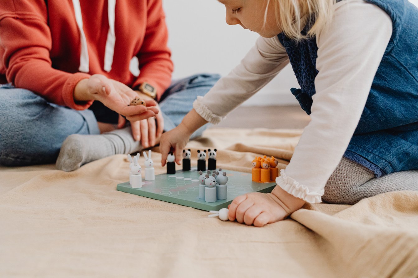 A Girl Playing Board Game